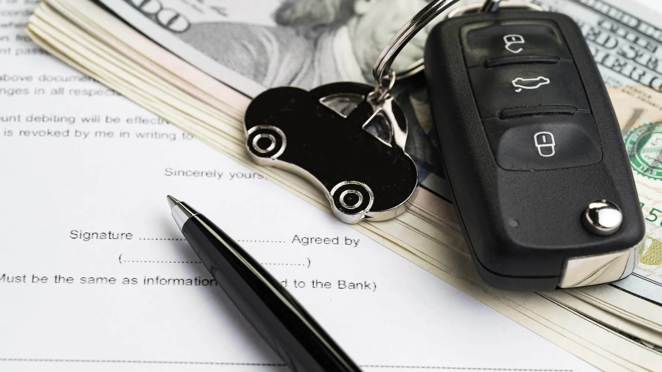 Vehicle loan documents and payment errors linked to misapplied funds and wrongful repossession risks.